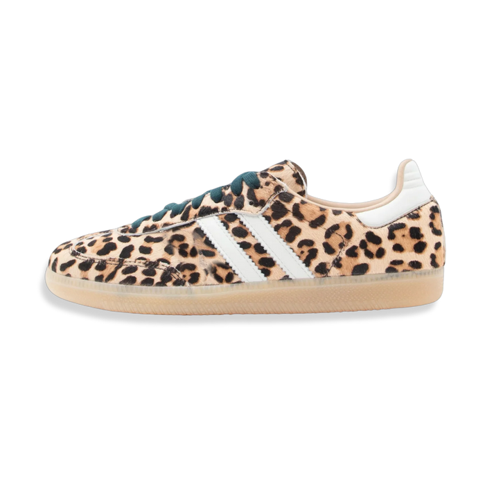 Light leopard trainers with green laces