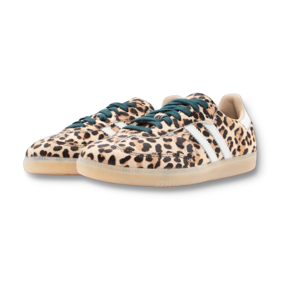 Light leopard trainers with green laces