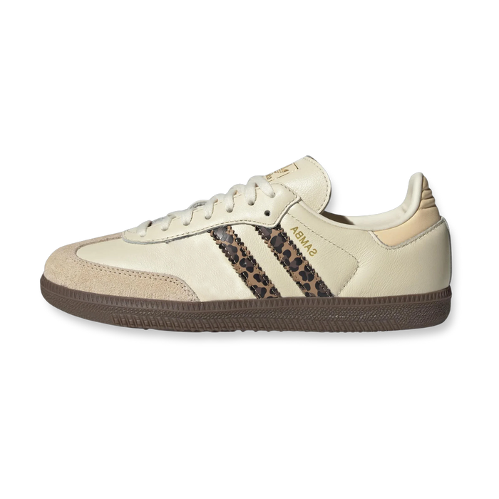 Cream trainers with leopard stripes