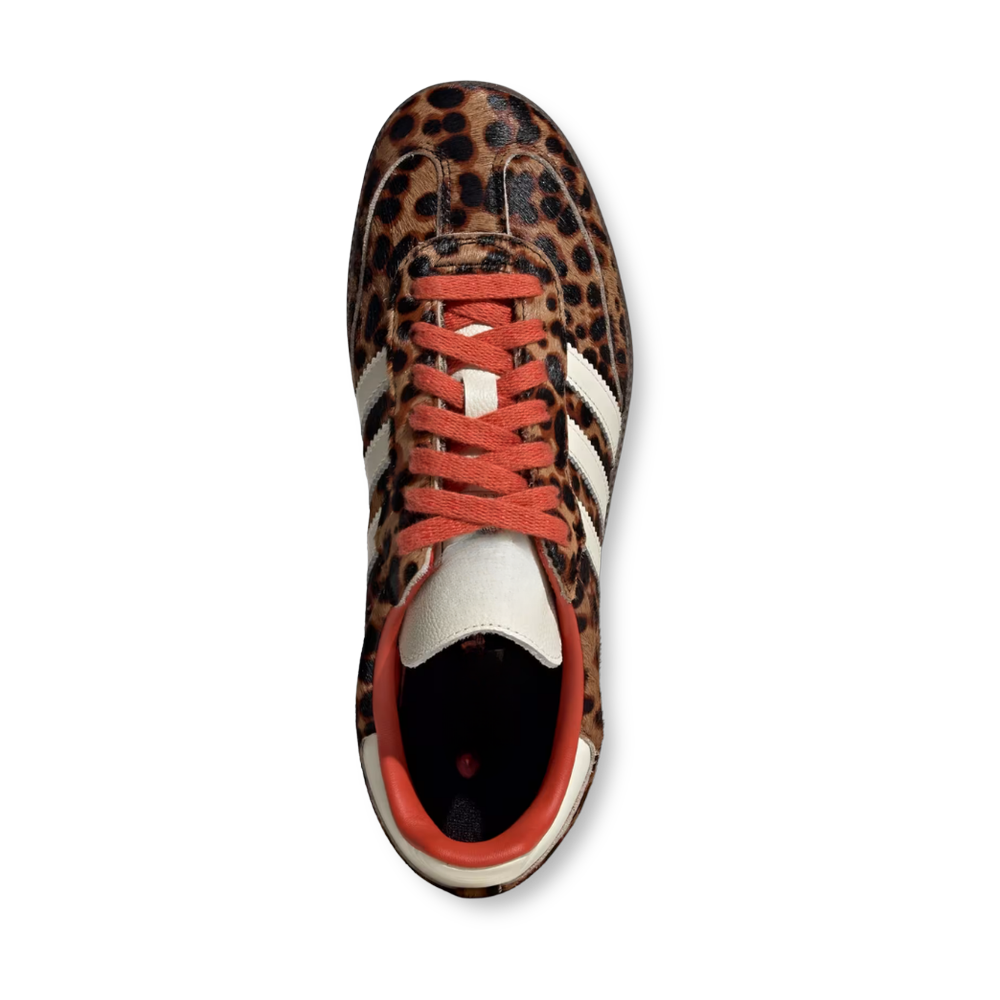 Dark leopard trainers with red laces