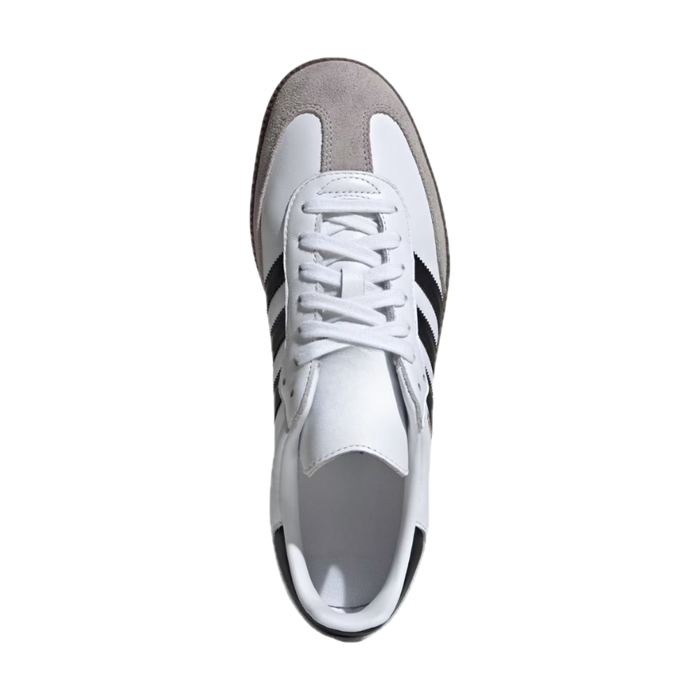 White classic trainers with black details